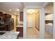 View of entryway from kitchen, showing laundry area at 26053 W Tonopah Dr, Buckeye, AZ 85396