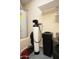 Garage interior with water heater and water softener at 26053 W Tonopah Dr, Buckeye, AZ 85396