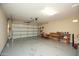 Two-car garage with workbench and storage at 26053 W Tonopah Dr, Buckeye, AZ 85396