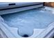 Hot tub with clean water and a cover at 26053 W Tonopah Dr, Buckeye, AZ 85396