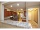 Spacious kitchen with granite countertops and stainless steel appliances at 26053 W Tonopah Dr, Buckeye, AZ 85396
