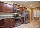 Kitchen with stainless steel appliances and granite countertops at 26053 W Tonopah Dr, Buckeye, AZ 85396