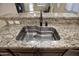 Stainless steel sink with granite countertop at 26053 W Tonopah Dr, Buckeye, AZ 85396