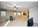 Open living room with view of kitchen and backyard at 26053 W Tonopah Dr, Buckeye, AZ 85396