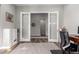 Bright home office with French doors leading to another room at 26183 W Rosemonte Dr, Buckeye, AZ 85396