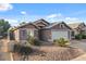 One-story house with a two-car garage and desert landscaping at 645 E Gary Dr, Chandler, AZ 85225