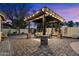 Pergola with string lights and comfortable seating at 6624 S Wilson Dr, Chandler, AZ 85249