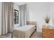 Cozy bedroom with a single bed and large window at 16064 E Ridgestone Dr, Fountain Hills, AZ 85268