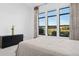 Bedroom with large windows and golf course view at 16064 E Ridgestone Dr, Fountain Hills, AZ 85268