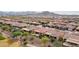 Community overview showing numerous homes and a golf course at 26822 W Oraibi Dr, Buckeye, AZ 85396
