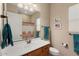Bathroom with single vanity and shower/tub combo at 26822 W Oraibi Dr, Buckeye, AZ 85396