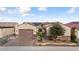 One-story home with solar panels and desert landscaping at 26822 W Oraibi Dr, Buckeye, AZ 85396