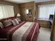 Bright bedroom with double bed and ample closet space at 4065 E University Dr # 140, Mesa, AZ 85205