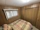 Bright bedroom with a double bed and ample closet space at 4065 E University Dr # 140, Mesa, AZ 85205