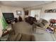 Living room with couches and a TV at 4065 E University Dr # 140, Mesa, AZ 85205