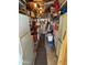 Storage room with shelving, refrigerator, and additional items at 4065 E University Dr # 140, Mesa, AZ 85205