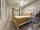 Spacious bedroom with a ceiling fan and large window at 5201 W Camelback W Rd # D69, Phoenix, AZ 85031