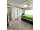 Spacious Primary bedroom with ample closet space and plush carpeting at 5201 W Camelback W Rd # D69, Phoenix, AZ 85031