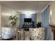 Living room with two armchairs, TV, and exercise bike at 5201 W Camelback W Rd # D69, Phoenix, AZ 85031