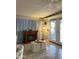 Living room with fireplace and access to patio at 5201 W Camelback W Rd # D69, Phoenix, AZ 85031