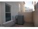 Home exterior featuring an AC unit and a portion of the house at 9527 N 82Nd Ln, Peoria, AZ 85345