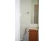 Small bathroom with a toilet, sink, and vanity at 9527 N 82Nd Ln, Peoria, AZ 85345