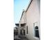 Tan two-story house with covered patio and gravel yard at 9527 N 82Nd Ln, Peoria, AZ 85345