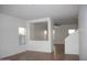 Bright and airy living room with tiled floors and a ceiling fan at 9527 N 82Nd Ln, Peoria, AZ 85345