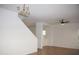 Living area with tile floors and a ceiling fan at 9527 N 82Nd Ln, Peoria, AZ 85345