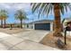 Front view of a remodeled home with a gray garage door at 10610 N 50Th Ave, Glendale, AZ 85304