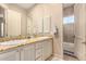Bathroom with double vanity and granite countertop at 10975 E Greenway Rd, Scottsdale, AZ 85255