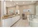 Elegant bathroom with double vanity and soaking tub at 10975 E Greenway Rd, Scottsdale, AZ 85255