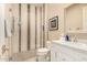 Modern bathroom with a large shower and white vanity at 10975 E Greenway Rd, Scottsdale, AZ 85255
