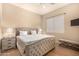 Spacious Primary bedroom with plush bed and neutral decor at 10975 E Greenway Rd, Scottsdale, AZ 85255