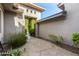 Private courtyard with a bench and small fountain at 10975 E Greenway Rd, Scottsdale, AZ 85255