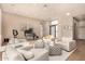 Spacious living room with hardwood floors and ample natural light at 10975 E Greenway Rd, Scottsdale, AZ 85255