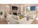 Living area with fireplace, hardwood floors, and comfortable seating at 10975 E Greenway Rd, Scottsdale, AZ 85255