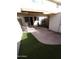 Private backyard with patio and artificial turf at 1217 E Fremont Dr, Tempe, AZ 85282