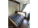 Bedroom with dark wood flooring and window curtains at 1217 E Fremont Dr, Tempe, AZ 85282