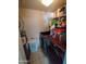 Laundry room with washer, dryer, and storage shelves at 1217 E Fremont Dr, Tempe, AZ 85282