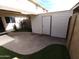 Private patio with artificial turf and storage shed at 1217 E Fremont Dr, Tempe, AZ 85282