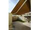 Covered patio with artificial turf and seating area at 1217 E Fremont Dr, Tempe, AZ 85282