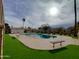Community swimming pool with benches and grassy areas at 1217 E Fremont Dr, Tempe, AZ 85282