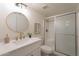 Modern bathroom with white vanity and walk-in shower at 13316 N 26Th Dr, Phoenix, AZ 85029