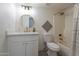 Updated bathroom with white vanity and bathtub at 13316 N 26Th Dr, Phoenix, AZ 85029