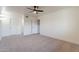 Spacious bedroom featuring ceiling fan and ample closet space at 13316 N 26Th Dr, Phoenix, AZ 85029