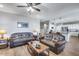 Rustic living room with leather couches and western decor at 13982 S 209Th Ave, Buckeye, AZ 85326