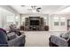 Living room with entertainment center and comfortable seating at 19778 W Lincoln St, Buckeye, AZ 85326