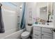 Clean bathroom with a tub, toilet and vanity at 3538 E Hazeltine Way, Queen Creek, AZ 85142