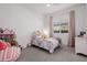 bedroom with a twin bed and playful decor at 3538 E Hazeltine Way, Queen Creek, AZ 85142
